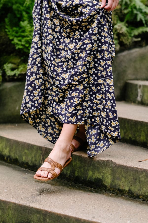 Circus by Sam Edelman Betty braided leather slide sandals styled with a floral maxi dress.
