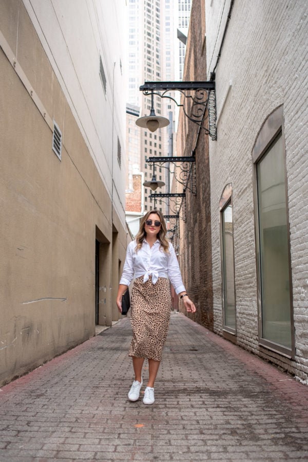 Chicago fashion blogger Jessica Sturdy of Bows & Sequins styling a leopard print silk midi skirt.