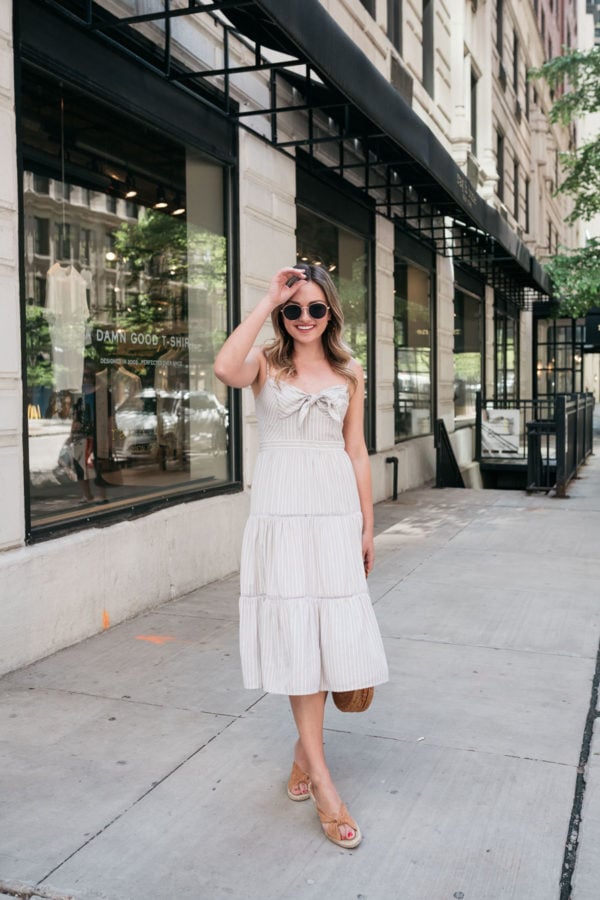 Chicago lifestyle blogger Jessica Sturdy of Bows & Sequins styling an Eliza J khaki tiered sundress with Splendid slip-on wedges.