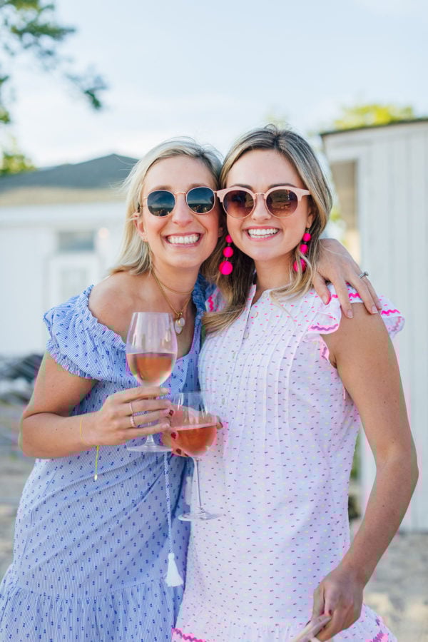 Preppy fashion and lifestyle bloggers Julia Dzafic of Lemon Stripes and Jessica Sturdy of Bows & Sequins at Wee Burn Beach Club wearing Sail to Sable Dresses.