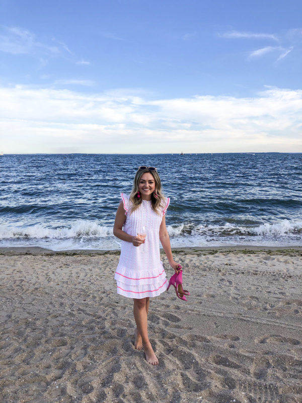 Preppy fashion blogger Jessica Sturdy of Bows & Sequins wearing a Sail to Sable funfetti ruffle ric rac dress at Wee Burn Beach Club in Rowayton, Connecticut.