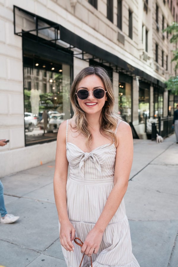 Chicago lifestyle influecer Jessica Sturdy of Bows & Sequins styling a neutral tie-front dress.