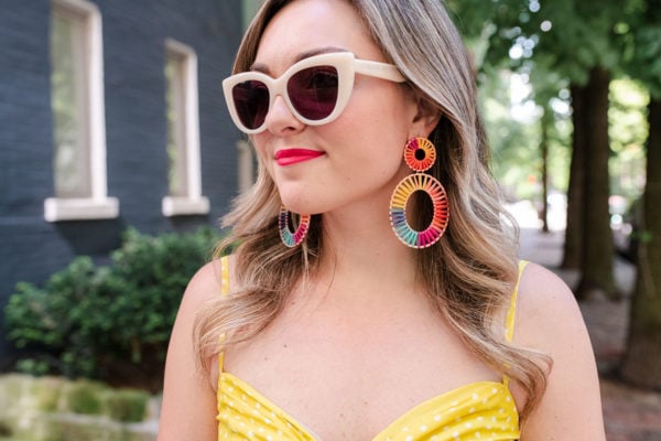 Chicago fashion blogger Bows & Sequins wearing colorful BaubleBar earrings and retro sunglasses from Boden.