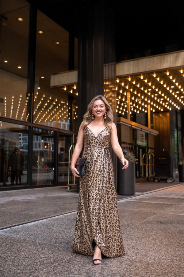 Chicago lifestyle influencer Bows & Sequins wearing a floor length sequin leopard print dress for New Years Eve.