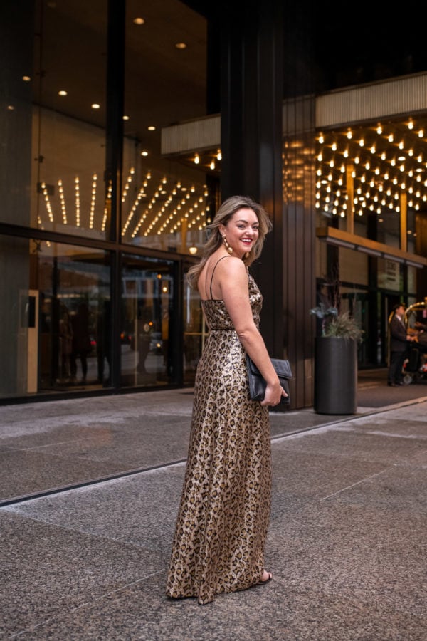 Chicago fashion influencer Bows & Sequins styling a floor length sequin dress for the holidays.