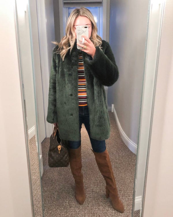 Chicago stylist wearing green faux fur coat with cognac suede knee high boots.