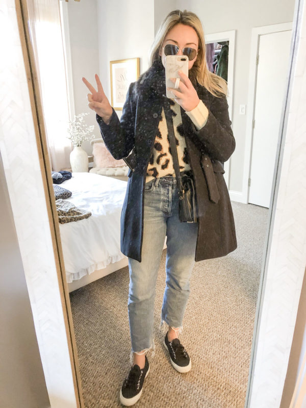 Blogger styling leopard sweater with mom jeans and Superga sneakers.