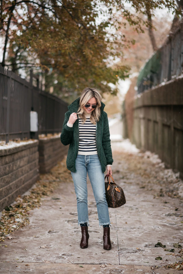 Chicago blogger wearing a striped sweater cropped jeans for a cute fall winter outfit.