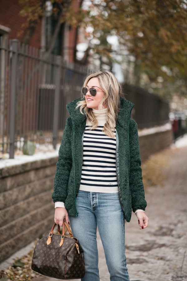 Fashion blogger wearing the Dudley Stephens Brooklyn Bomber in green brushed fleece.