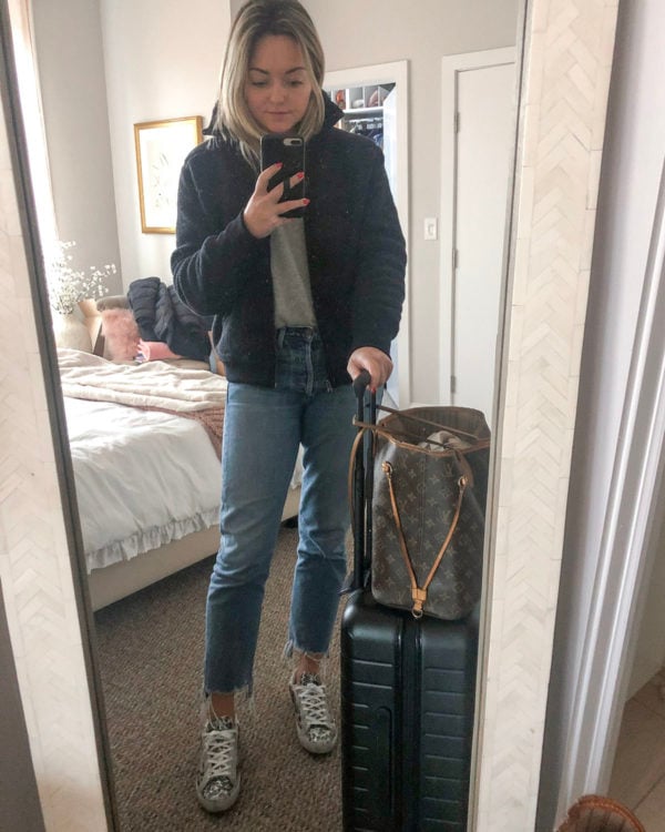 Travel Outfit: Black Fleece Bomber Jacket, Citizens of Humanity Charlotte Crop Jeans, Golden Goose Leopard Glitter Sneakers