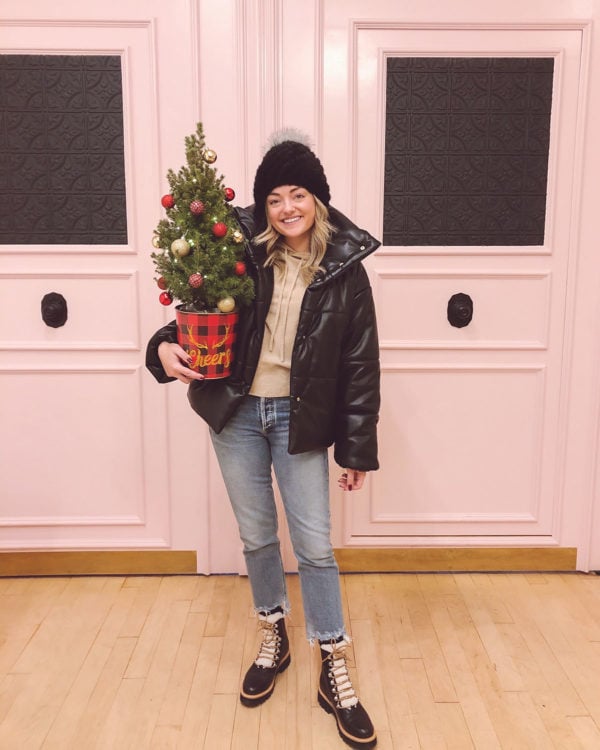 Chicago fashion blogger Bows & Sequins wearing a Nanushka Leather Puffer with Marc Fisher Izzy Shearling Booties.