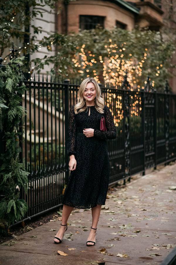 Chicago personal stylist Jessica Sturdy of Bows & Sequins styling a black velvet midi dress with classic ankle strap heels for a holiday Christmas party.