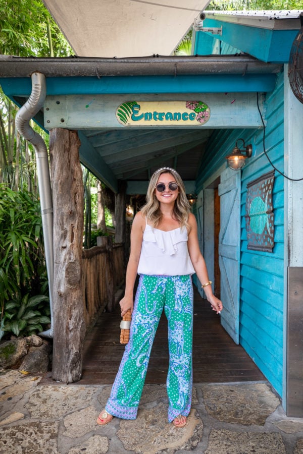 Jessica Sturdy wearing Lilly Pulitzer Cheetah Printed Palazzo Pants and Guanabana's in Florida with a pearl headband.