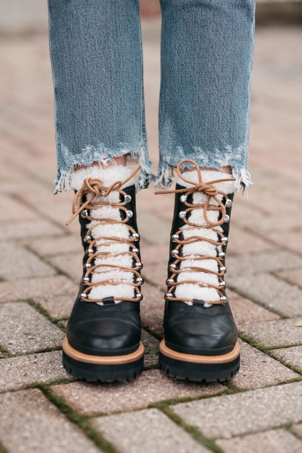 Fashion blogger styling Marc Fisher Izzie Booties in Black Leather with Raw Hem Jeans