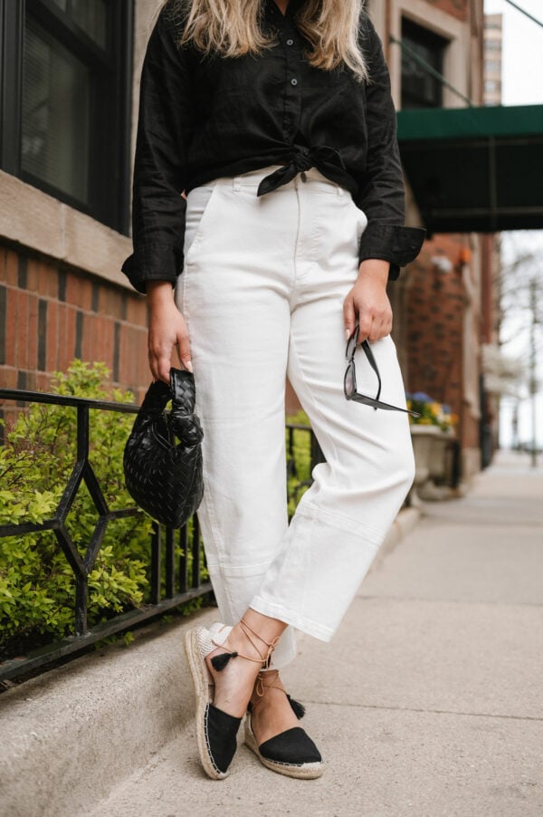 Fashion blogger styling a pair of barrel balloon pants.