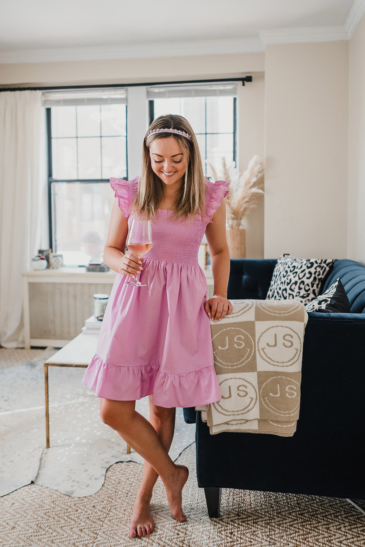 Fashion blogger Jessica Sturdy of Bows & Sequins wearing a Hill House Short Elizabeth Nap Dress at Home with a Custom Initial Blanket inspired by Hermes