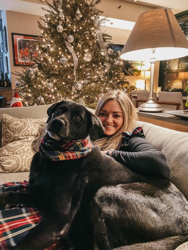Chicago blogger Bows & Sequins wearing a plaid nap dress with her dog Marley wearing a plaid Foggy Dog bandana.