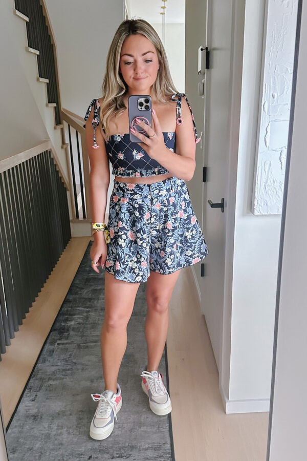 Chicago influencer Jessica Sturdy of Bows & Sequins styling an Agua Bendita set and Nike Air Force 1s for a concert at Lollapalooza.