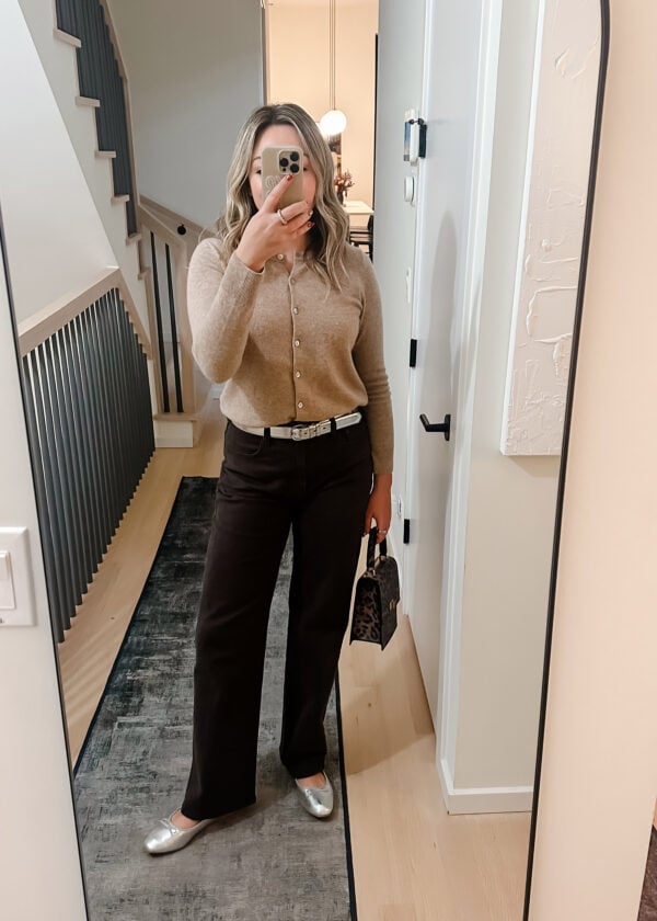 Chicago style blogger wearing a Quince cashmere cardigan with chocolate brown jeans and silver ballet flats.