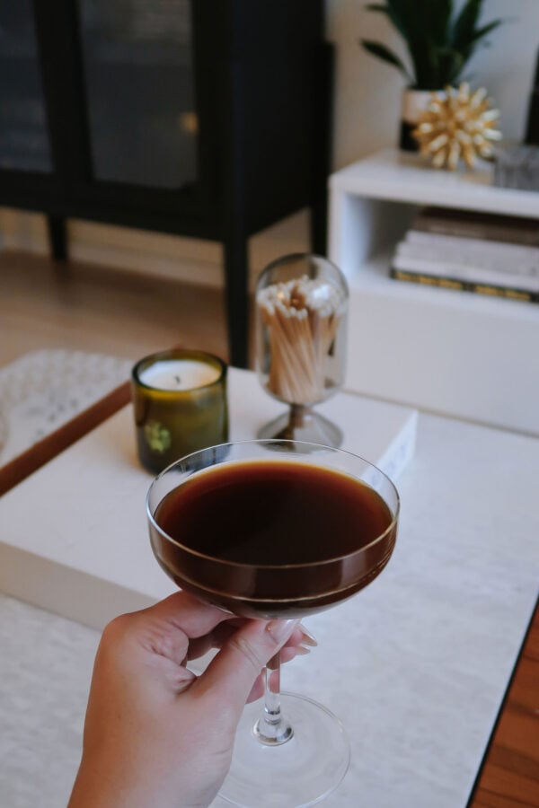 Health and wellness Chicago-based lifestyle blogger Bows & Sequins shares her favorite non alcoholic espresso martini in her living room.