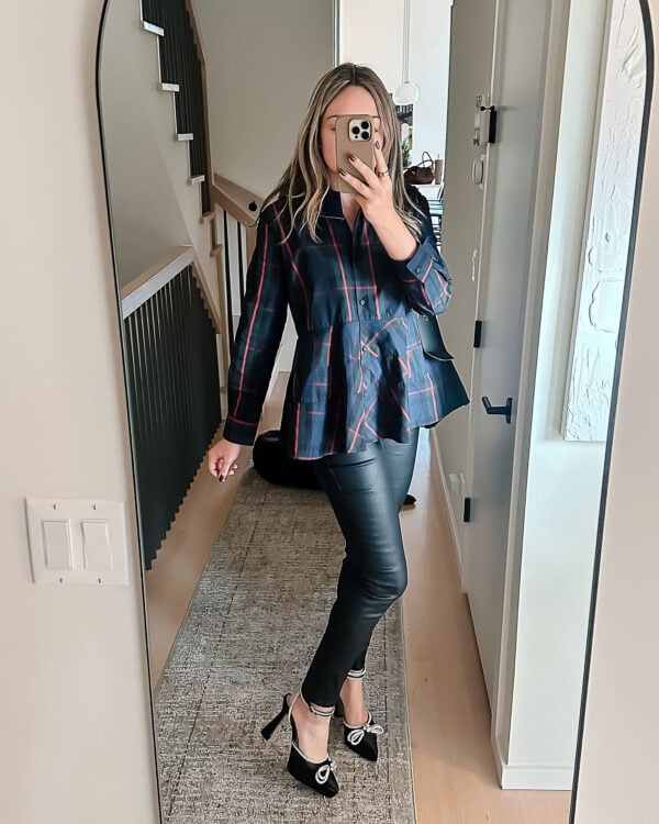 Fashion blogger Jessica Sturdy wearing a plaid peplum shirt from Tuckernuck with coated jeans and platform rhinestone bow heels.