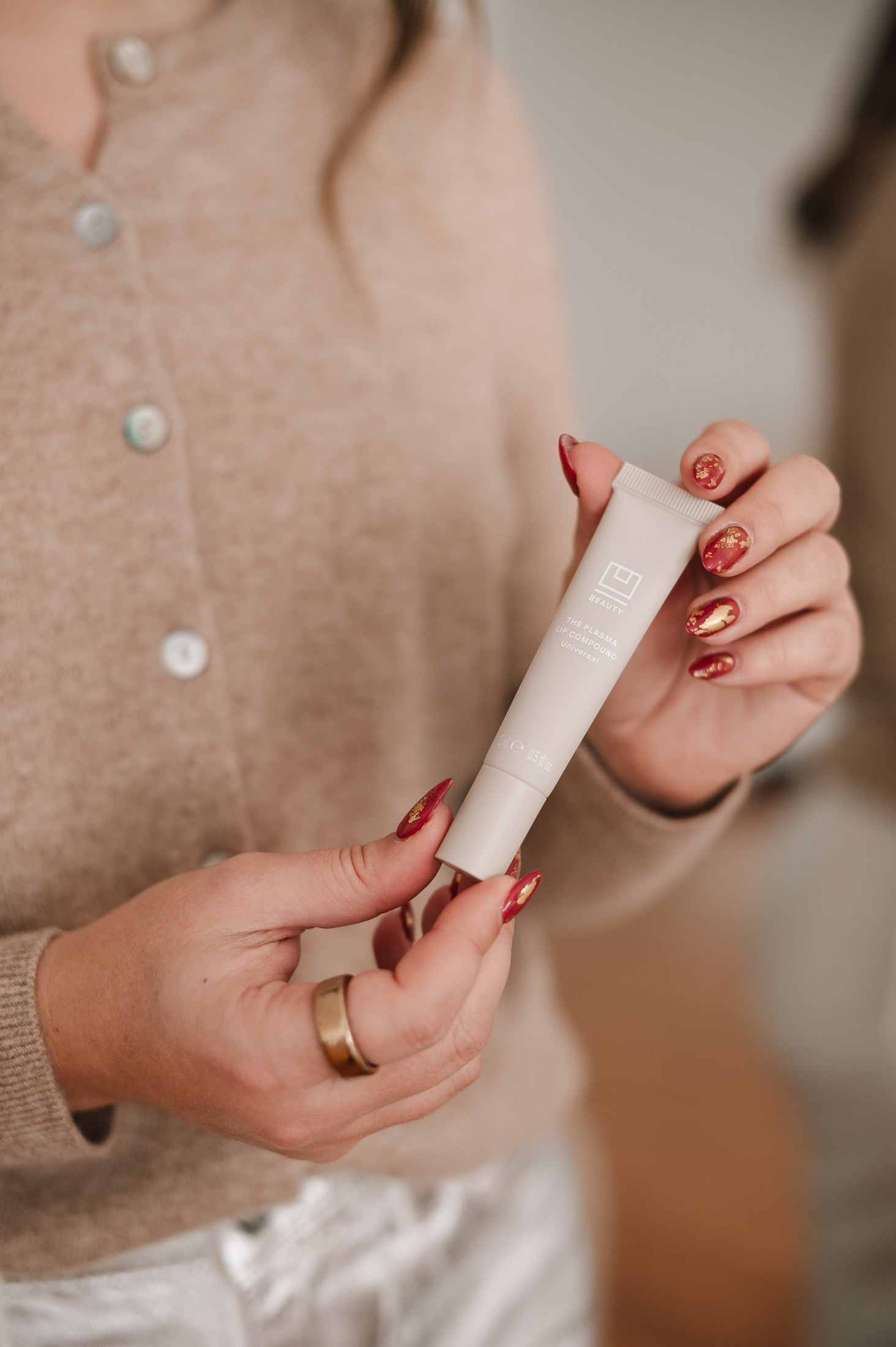 Close-up of U Beauty Plasma Lip Compound in clear shade